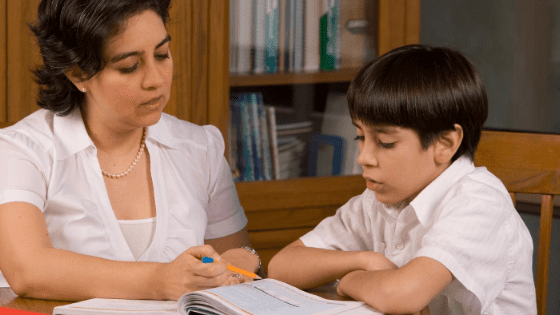 mother homeschooling child