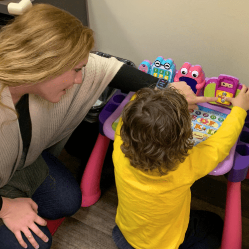 therapist and child doing ABA therapy