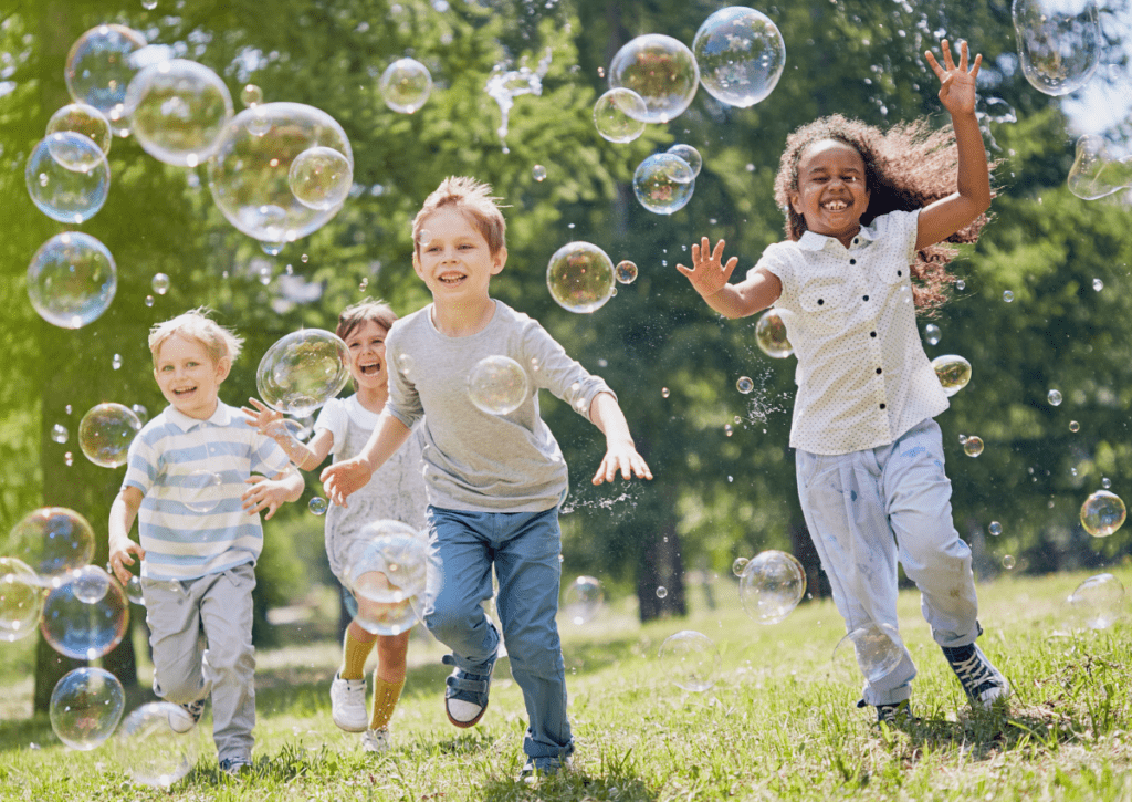 summer break kids playing with bubbles